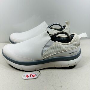Alegria Shift Lead is a white slip-on athletic shoe designed for comfort size 41